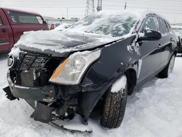 CADILLAC SRX PERFOR 2013 with VIN 3GYFNDE34DS617268 - Photo from auction