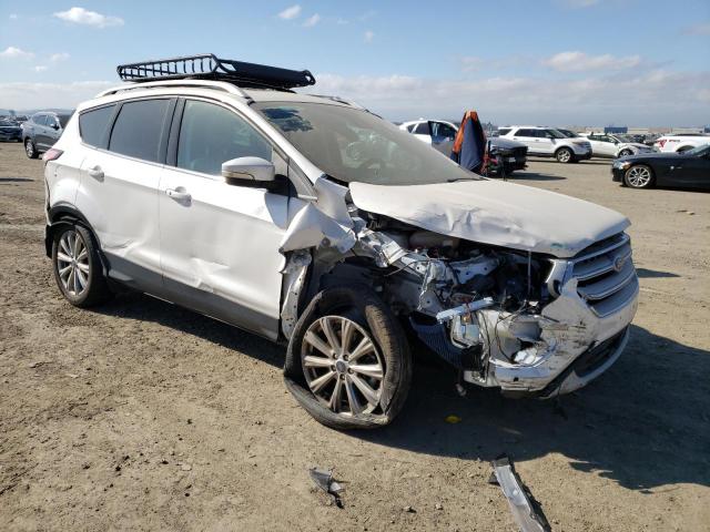 Photo 4 from auction – 2018 FORD ESCAPE TIT with VIN 1FMCU0J98JUC70842