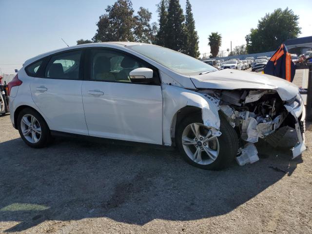 Photo 4 from auction – 2014 FORD FOCUS SE with VIN 1FADP3K28EL391682