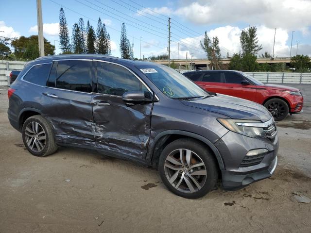 Photo 4 from auction – 2016 HONDA PILOT TOUR with VIN 5FNYF5H95GB017633
