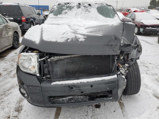 Photo 11 from auction – 2011 FORD ESCAPE LIM with VIN 1FMCU0E75BKC10104