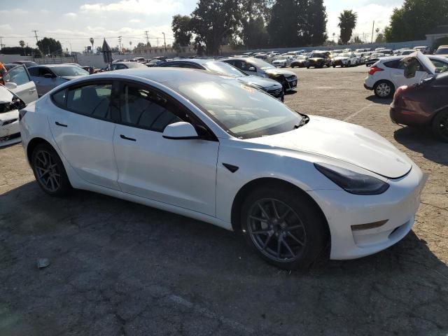 Photo 4 from auction – 2022 TESLA MODEL 3 with VIN 5YJ3E1EA3NF288918