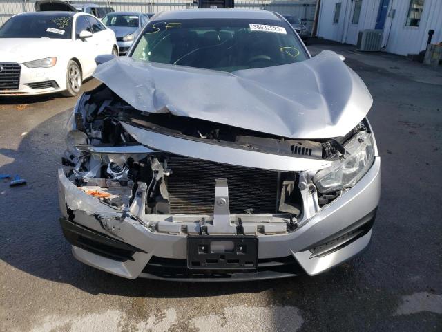 Photo 5 from auction – 2018 HONDA CIVIC LX with VIN 19XFC2F57JE018729