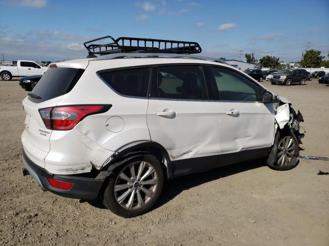Photo 3 from auction – 2018 FORD ESCAPE TIT with VIN 1FMCU0J98JUC70842
