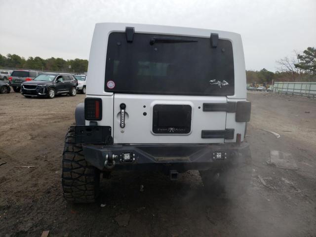 Photo 6 from auction – 2011 JEEP WRANGLER U with VIN 1J4HA7H13BL590793