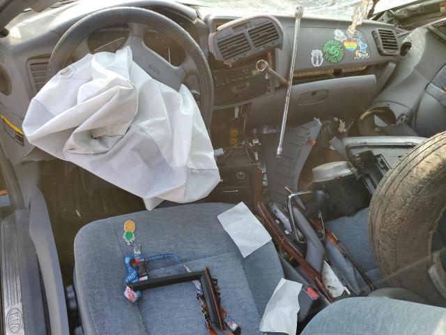 Photo 8 from auction – 2003 KIA OPTIMA LX with VIN KNAGD128035196652