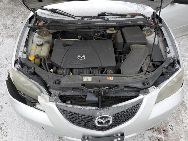 Photo 11 from auction – 2004 MAZDA 3 I with VIN JM1BK12F941176703
