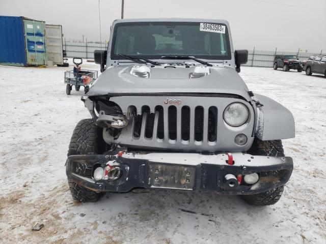 Photo 5 from auction – 2016 JEEP WRANGLER U with VIN 1C4BJWFG6GL276897