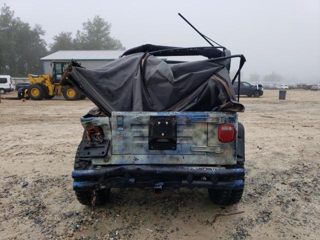 Photo 6 from auction – 2000 JEEP WRANG SE with VIN 1J4FA29P1YP781126