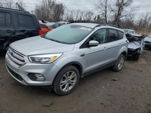 FORD ESCAPE SE 2018 with VIN 1FMCU0GDXJUC03719 - Photo from auction