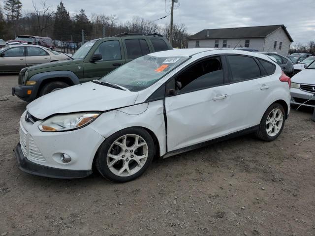 FORD FOCUS SE 2014 with VIN 1FADP3K25EL318396 - Photo from auction