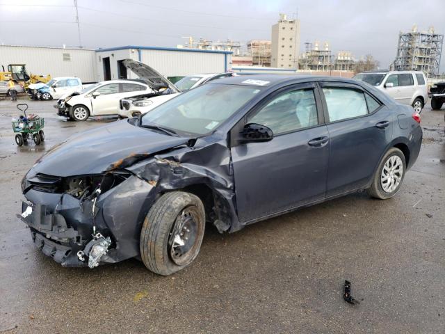 TOYOTA COROLLA L 2019 with VIN 5YFBURHE1KP869815 - Photo from auction