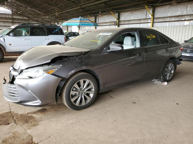 TOYOTA CAMRY LE 2017 with VIN 4T1BF1FK1HU345009 - Photo from auction