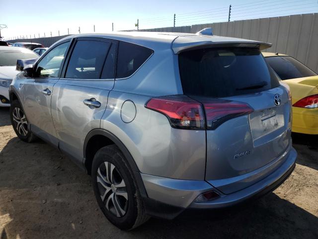 Photo 2 from auction – 2018 TOYOTA RAV4 LE with VIN JTMZFREV8JJ185764