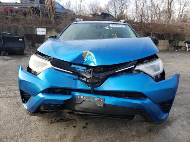 Photo 5 from auction – 2017 TOYOTA RAV4 LE with VIN JTMBFREV2HJ714637