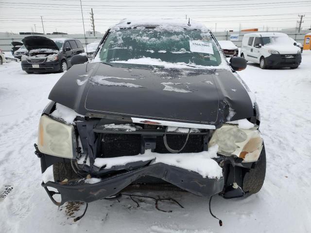 Photo 5 from auction – 2005 GMC ENVOY XL with VIN 1GKET16S756132984
