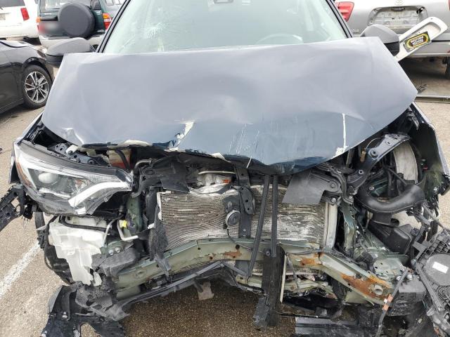 Photo 12 from auction – 2018 TOYOTA RAV4 LE with VIN 2T3BFREV2JW725693