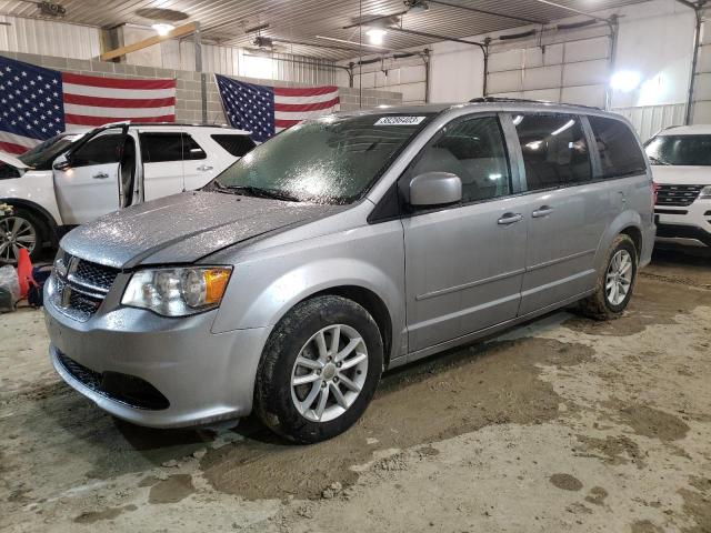 DODGE GRAND CARA 2015 with VIN 2C4RDGCGXFR712592 - Photo from auction