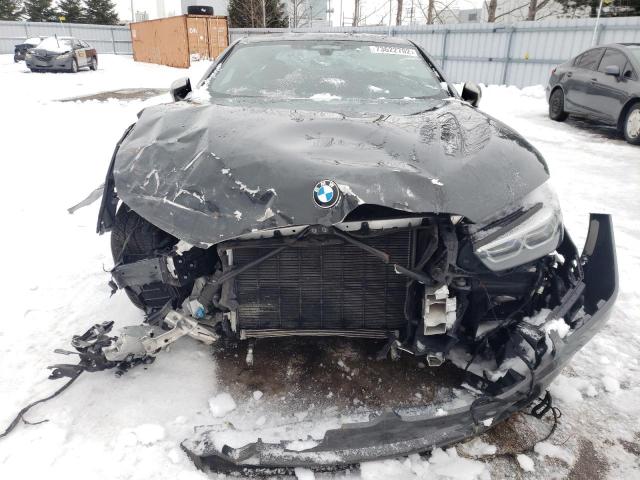 Photo 5 from auction – 2019 BMW M850XI with VIN WBABC4C52KBU95448