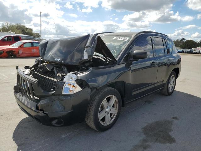 JEEP COMPASS SP 2010 with VIN 1J4NT4FA5AD575090 - Photo from auction