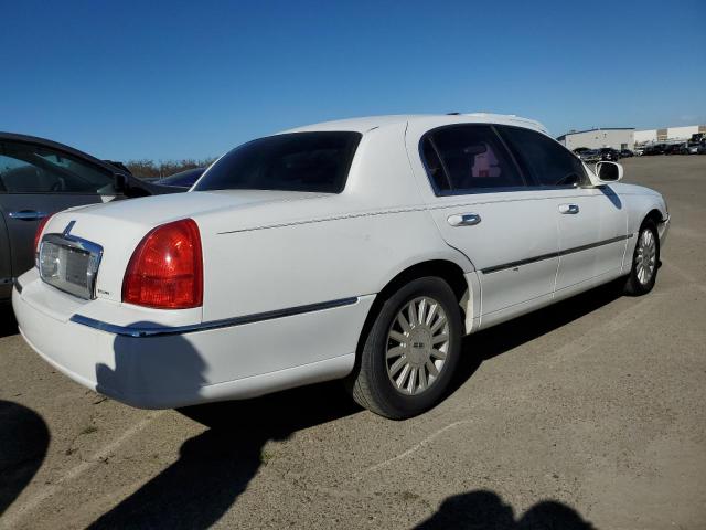 Photo 3 from auction – 2003 LINCOLN TOWN CAR E with VIN 1LNHM81W93Y660290