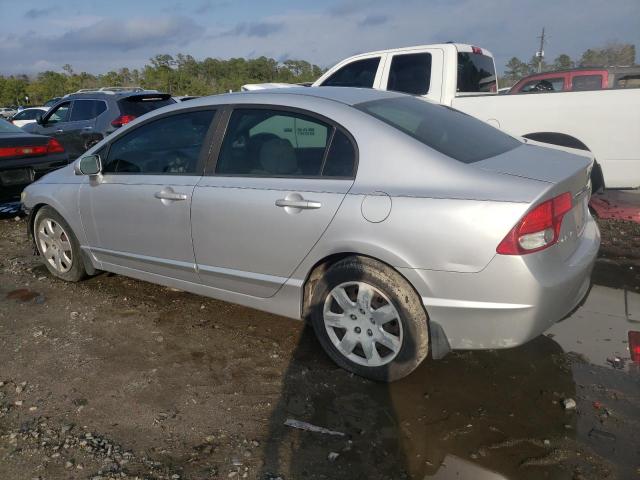 Photo 2 from auction – 2011 HONDA CIVIC LX with VIN 19XFA1F53BE040566