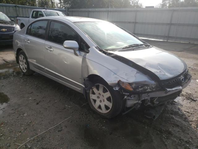 Photo 4 from auction – 2011 HONDA CIVIC LX with VIN 19XFA1F53BE040566