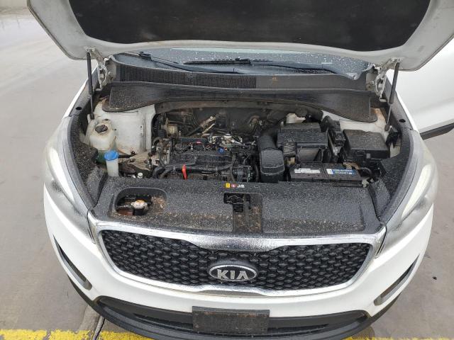 Photo 12 from auction – 2016 KIA SORENTO LX with VIN 5XYPG4A35GG012322