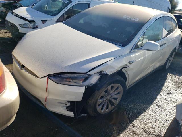 TESLA MODEL X 2018 with VIN 5YJXCAE2XJF111731 - Photo from auction