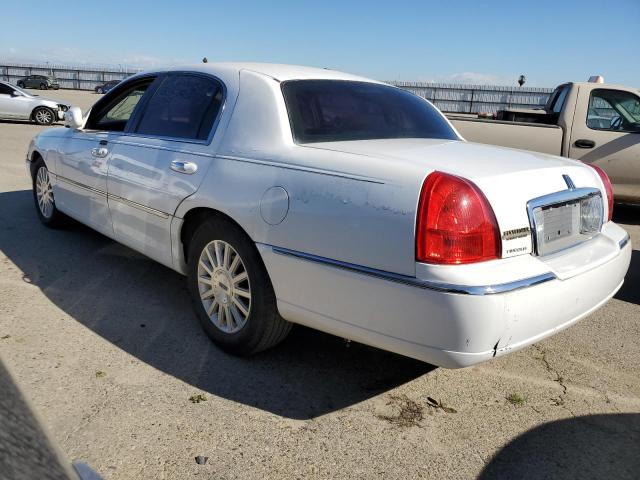 Photo 2 from auction – 2003 LINCOLN TOWN CAR E with VIN 1LNHM81W93Y660290