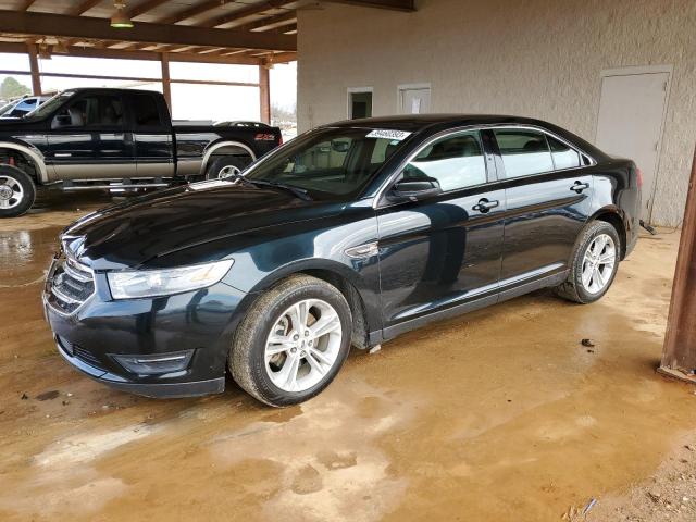 FORD TAURUS SEL 2014 with VIN 1FAHP2E82EG141858 - Photo from auction