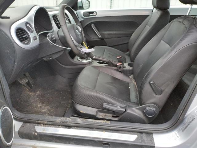 Photo 7 from auction – 2012 VOLKSWAGEN BEETLE with VIN 3VWJP7AT3CM618056