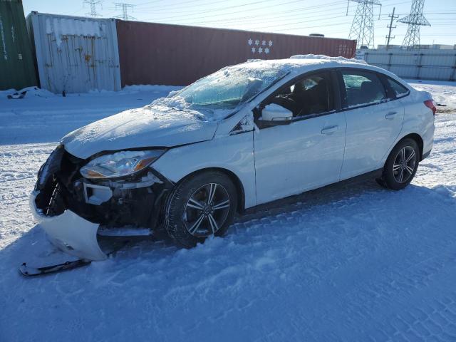 FORD FOCUS SE 2014 with VIN 1FADP3F20EL339554 - Photo from auction