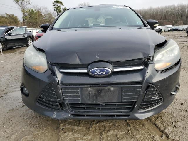 Photo 5 from auction – 2012 FORD FOCUS TITA with VIN 1FAHP3N23CL360740