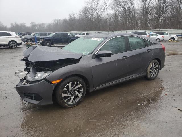HONDA CIVIC EX 2018 with VIN 2HGFC2F7XJH502868 - Photo from auction