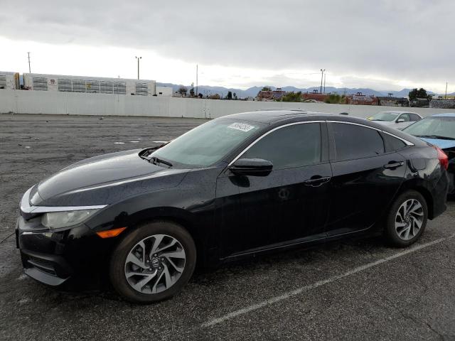 HONDA CIVIC EX 2017 with VIN 19XFC2F70HE230450 - Photo from auction