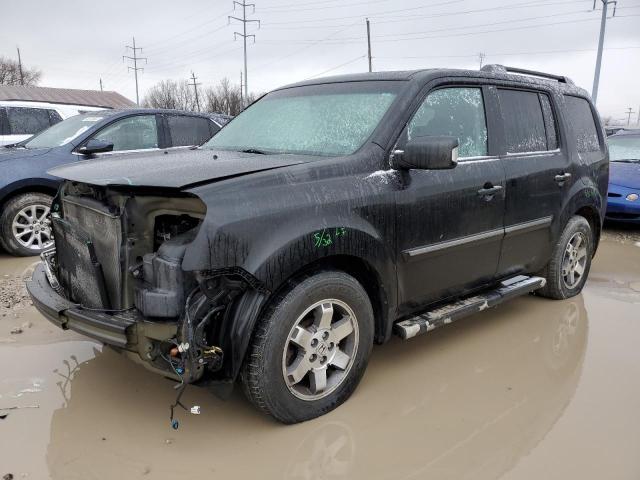 HONDA PILOT TOUR 2011 with VIN 5FNYF4H95BB075275 - Photo from auction