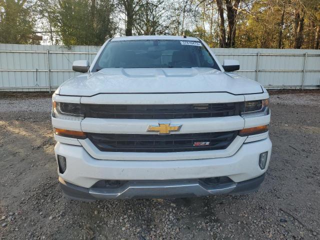 Photo 5 from auction – 2018 CHEVROLET SILVERADO with VIN 3GCUKREC4JG610497