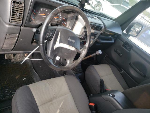 Photo 8 from auction – 2004 JEEP WRANGLER X with VIN 1J4FA39S94P802065