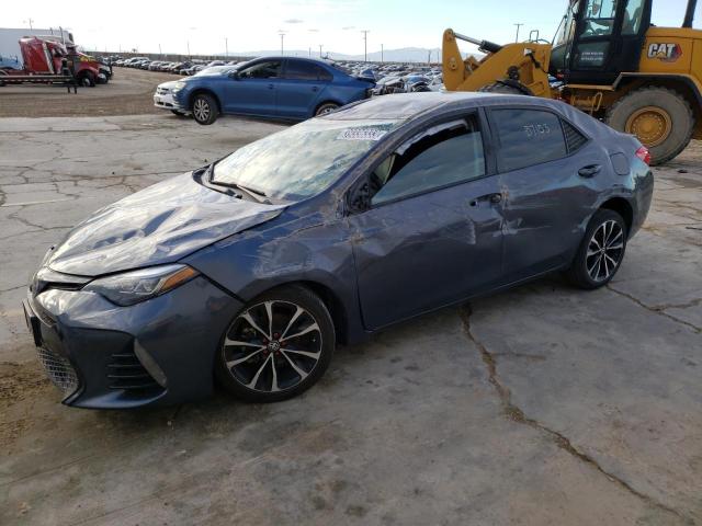 TOYOTA COROLLA L 2018 with VIN 5YFBURHE6JP819569 - Photo from auction