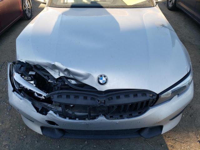 Photo 11 from auction – 2019 BMW 330I with VIN WBA5R1C56KAK10671