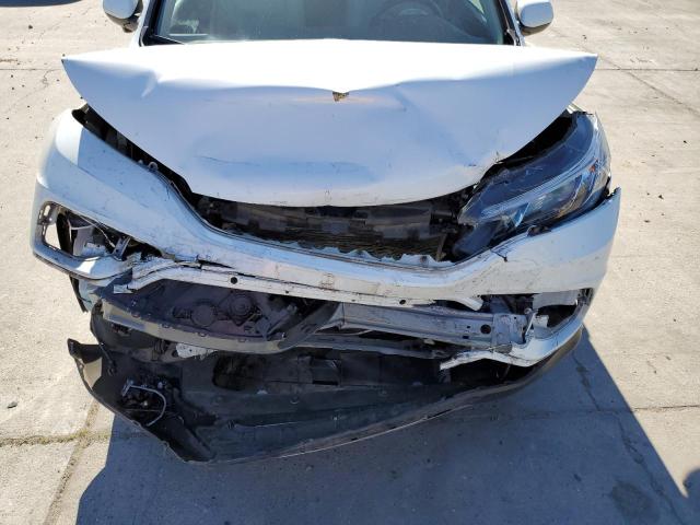 Photo 11 from auction – 2016 HONDA CR-V EXL with VIN 5J6RM4H77GL111801