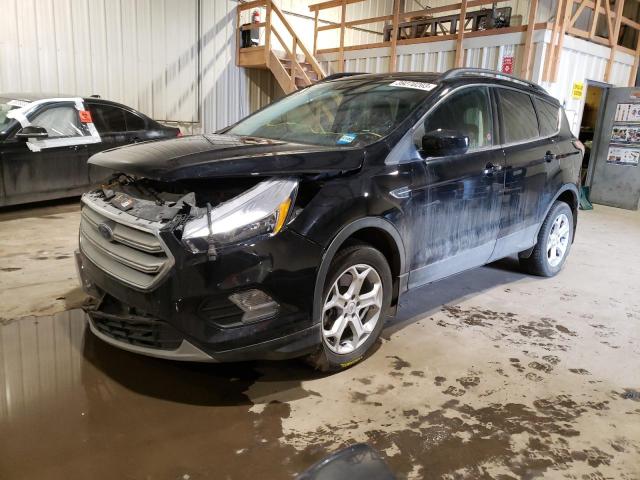 FORD ESCAPE SE 2018 with VIN 1FMCU9GD2JUC97261 - Photo from auction