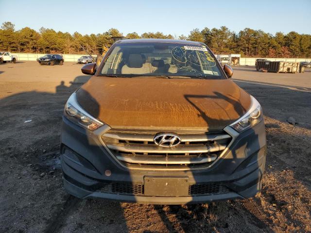 Photo 5 from auction – 2016 HYUNDAI TUCSON SE with VIN KM8J23A48GU035854