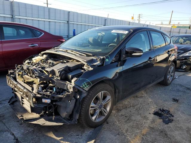 FORD FOCUS SE 2014 with VIN 1FADP3K23EL453473 - Photo from auction