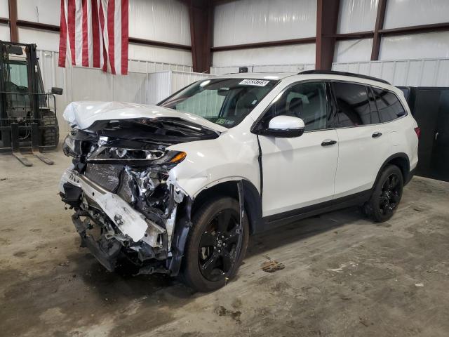 HONDA PILOT TOUR 2021 with VIN 5FNYF6H62MB073603 - Photo from auction