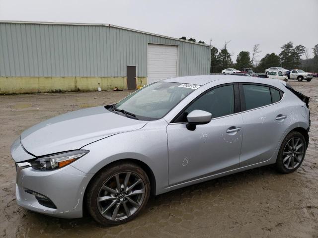 MAZDA 3 TOURING 2018 with VIN 3MZBN1L37JM256086 - Photo from auction