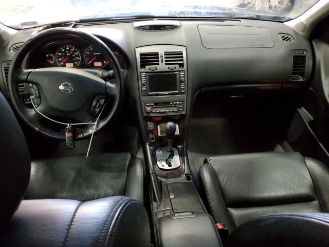 Photo 8 from auction – 2003 NISSAN MAXIMA GLE with VIN JN1DA31A63T420245