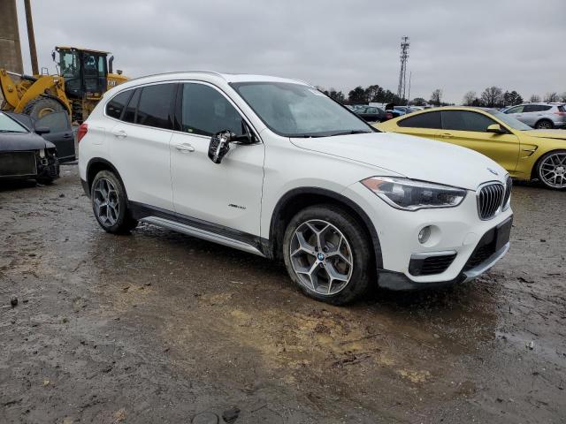 Photo 4 from auction – 2017 BMW X1 XDRIVE2 with VIN WBXHT3C35H5F72686
