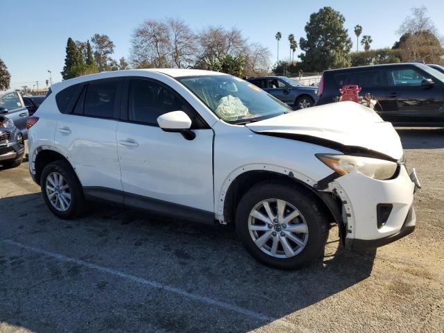 Photo 4 from auction – 2014 MAZDA CX-5 TOURI with VIN JM3KE2CY9E0331231